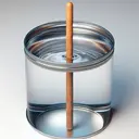 Visualize this scenario. A sealed metallic tin filled with clear water is on a smooth surface. A wooden rod with a natural brown color and a smooth surface is plunged into the water from above. The water level in the tin, originally close to the rim, reacts upon the entry of the wooden rod, slightly rising due to the displaced volume. The rod is partially submerged, showing the effect of buoyancy, while the other part of it remains visible and dry above the water surface, indicating the depth at which it is immersed.